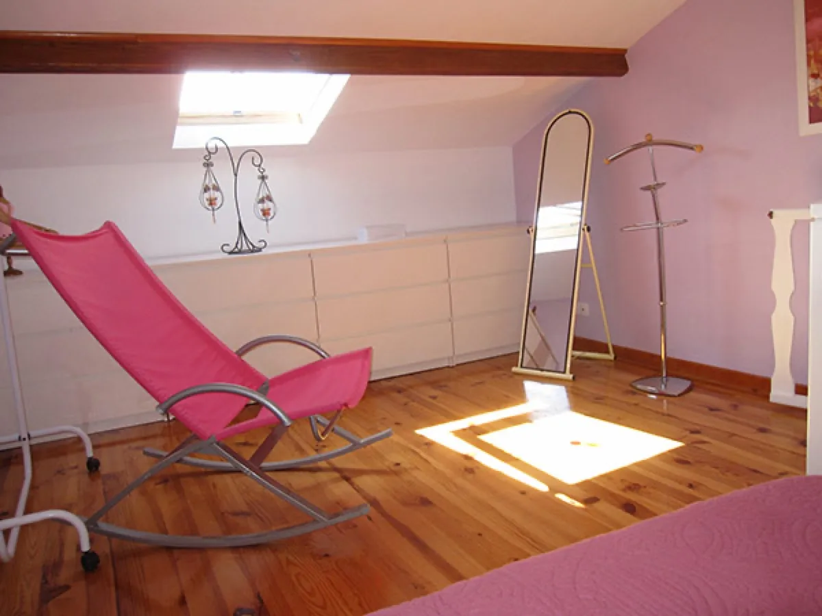 Chambre d'hôtes à Albi — intérieur cosy du Mas de Causse avec poutres apparentes